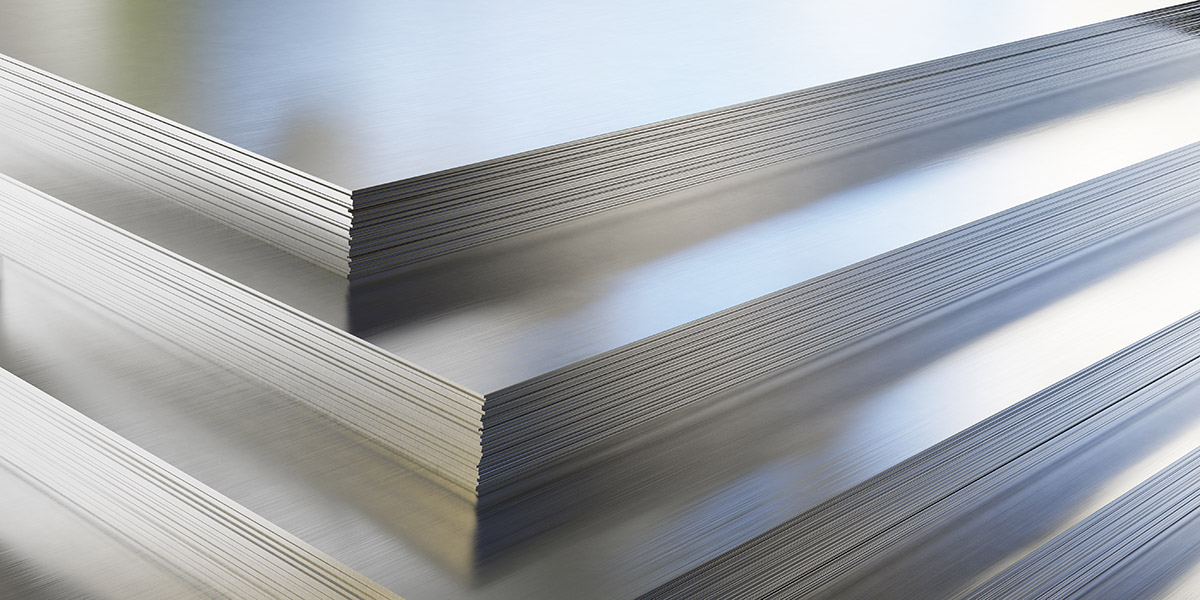 Several stacks of steel sheets placed on top of one another.